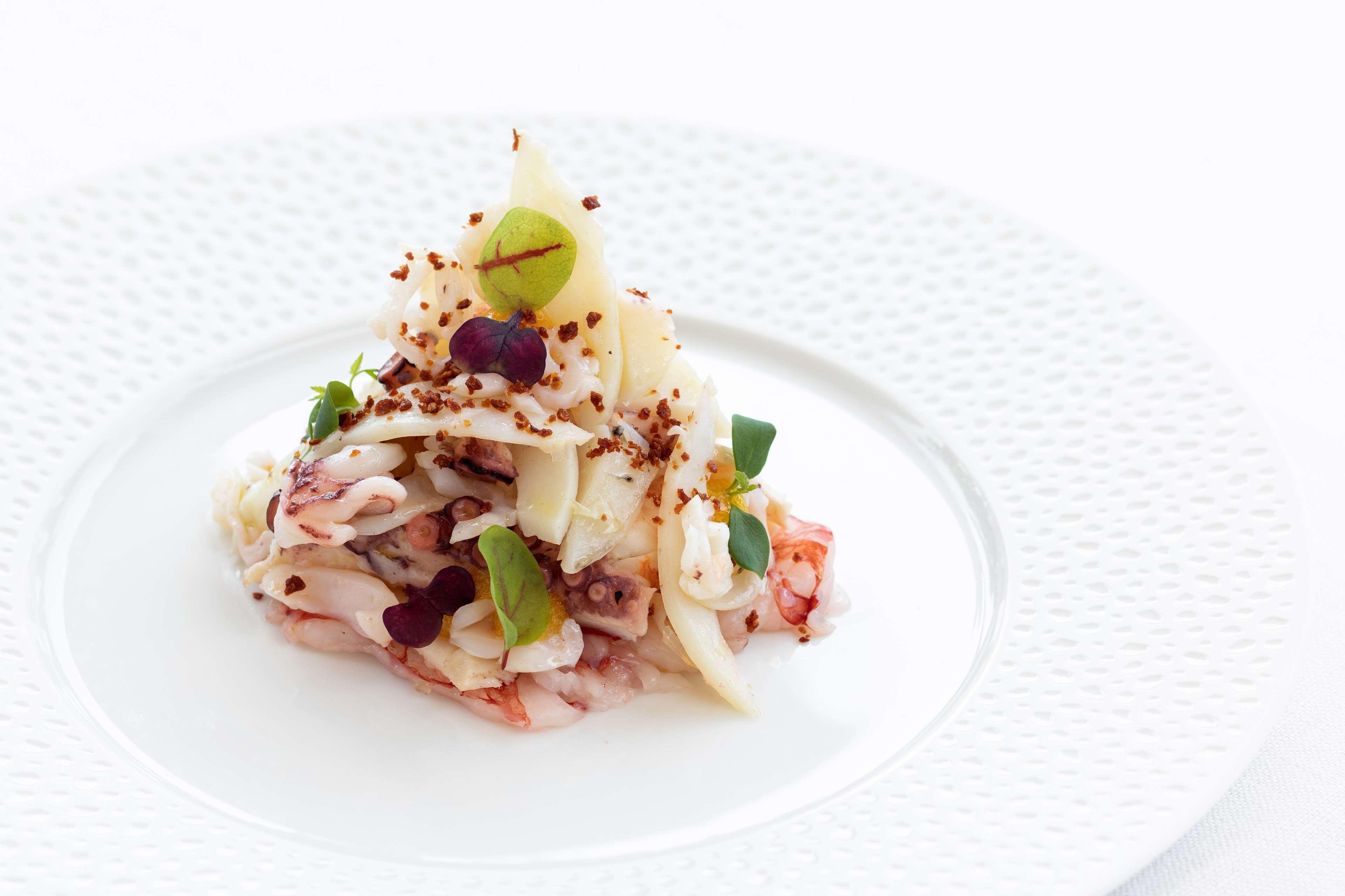 Grand Hotel Savoia Genoa Luaran gambar A salad prepared by the Culinary Team of the Hotel de la Paix, Lausanne